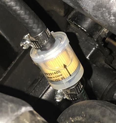 plastic housing for fuel filter vs metal|fuel filter under car.